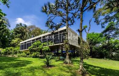 Imagem: A casa em condomínio possui 4 Dormitórios, 5 Banheiros, 5