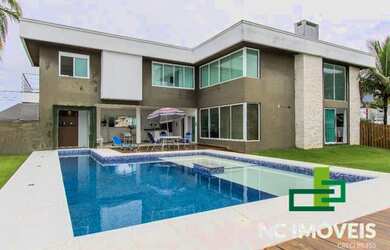 Imagem: A casa em condomínio possui 4 Dormitórios, 4 Banheiros, 2