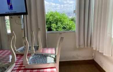 Imagem: A casa possui 3 Dormitórios, 2 Banheiros, 1 Vaga na garagem