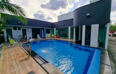 Imagem: A casa em condomínio possui 4 Dormitórios, 4 Banheiros, 4