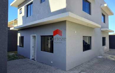 Imagem: A casa possui 3 Dormitórios, 2 Banheiros, 2 Vagas na garagem