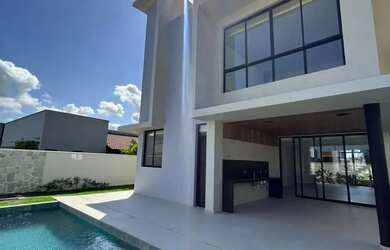 Imagem: A casa em condomínio possui 4 Dormitórios, 5 Banheiros, 4