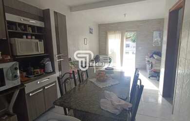 Imagem: A casa possui 2 Dormitórios, 1 Banheiro, 2 Vagas na garagem