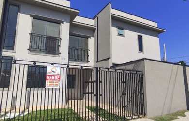 Imagem: A casa possui 3 Dormitórios, 2 Banheiros, 2 Vagas na garagem