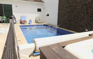 Imagem: A casa em condomínio possui 5 Dormitórios, 5 Banheiros, 4