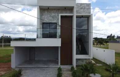 Imagem: A casa possui 3 Dormitórios, 5 Banheiros, 4 Vagas na garagem