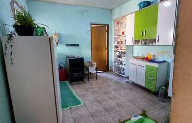 Imagem: A casa possui 3 Dormitórios, 2 Banheiros e está localizado