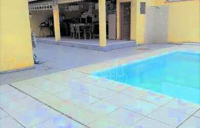 Imagem: A casa possui 3 Dormitórios, 3 Banheiros, 3 Vagas na garagem