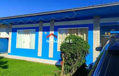 Imagem: A casa possui 4 Dormitórios, 3 Banheiros, 3 Vagas na garagem