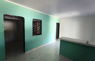 Imagem: A casa possui 2 Dormitórios, 1 Banheiro, 2 Vagas na garagem