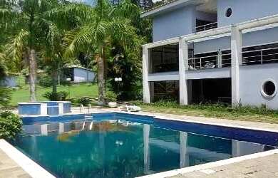 Imagem: A casa em condomínio possui 4 Dormitórios, 4 Banheiros, 5