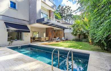 Imagem: A casa em condomínio possui 4 Dormitórios, 4 Banheiros, 4