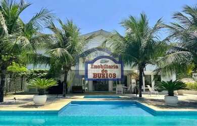 Imagem: A casa possui 5 Dormitórios, 5 Banheiros, 5 Vagas na garagem