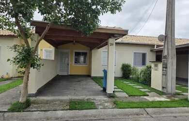 Imagem: A casa em condomínio possui 2 Dormitórios, 1 Banheiro, 2 Vagas