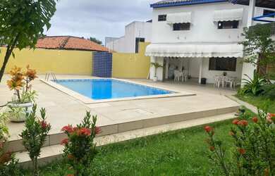 Imagem: A casa possui 5 Dormitórios, 5 Banheiros, 5 Vagas na garagem