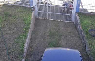 Imagem: A casa possui 3 Dormitórios, 3 Banheiros, 2 Vagas na garagem