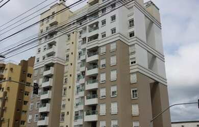 Imagem: O apartamento possui 2 Dormitórios, 1 Suíte, 2 Banheiros