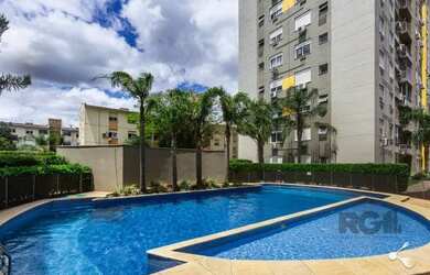 Imagem: O apartamento possui 3 Dormitórios, 1 Banheiro, 1 Vaga na garagem