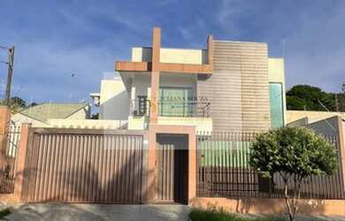 Imagem: A casa possui 5 Dormitórios, 5 Banheiros, 2 Vagas na garagem