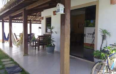 Imagem: A casa em condomínio e possui 5 Dormitórios, 5 Banheiros