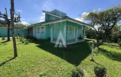 Imagem: A casa possui 3 Dormitórios, 3 Banheiros e 133m² de Área