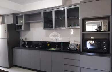 Imagem: O apartamento possui 3 Dormitórios, 2 Banheiros, 2 Vagas na