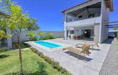 Imagem: A casa possui 4 Dormitórios, 4 Banheiros, 2 Vagas na garagem