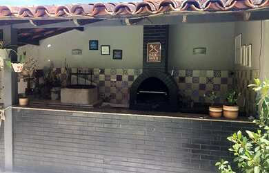 Imagem: A casa em condomínio possui 4 Dormitórios, 4 Banheiros, 4