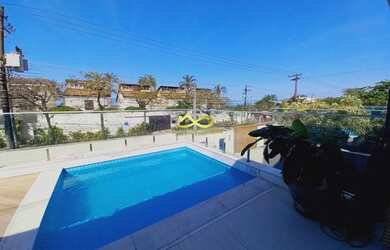 Imagem: A casa em condomínio possui 5 Dormitórios, 5 Banheiros, 3