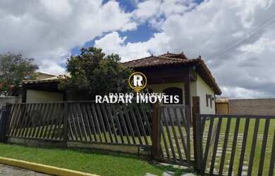 Imagem: A casa possui 3 Dormitórios, 4 Banheiros, 5 Vagas na garagem