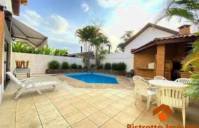 Imagem: A casa em condomínio possui 4 Dormitórios, 4 Banheiros, 4