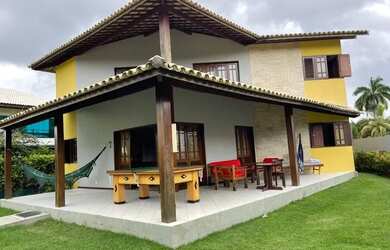 Imagem: A casa possui 5 Dormitórios, 4 Vagas na garagem e está localizado