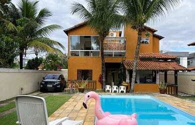 Imagem: A casa possui 5 Dormitórios, 5 Banheiros, 5 Vagas na garagem