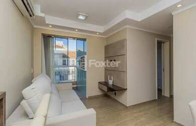 Imagem: O apartamento possui 2 Dormitórios, 1 Banheiro, 1 Vaga na garagem