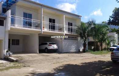 Imagem: A casa possui 2 Dormitórios, 2 Banheiros, 1 Vaga na garagem