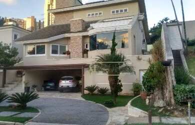 Imagem: A casa em condomínio possui 4 Dormitórios, 5 Banheiros, 4