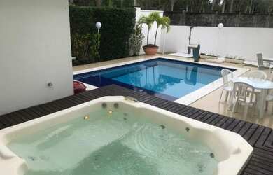 Imagem: A casa em condomínio possui 5 Dormitórios, 5 Banheiros, 4