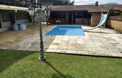 Imagem: A casa em condomínio possui 5 Dormitórios, 5 Banheiros, 4