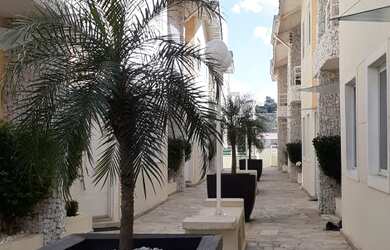 Imagem: A casa em condomínio possui 3 Dormitórios, 3 Banheiros, 2