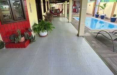 Imagem: A casa possui 3 Dormitórios, 2 Vagas na garagem e está localizado