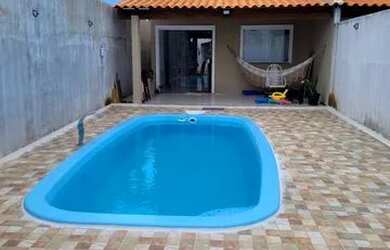 Imagem: A casa possui 3 Dormitórios, 4 Banheiros, 3 Vagas na garagem