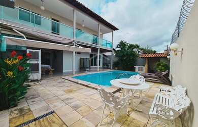 Imagem: A casa possui 3 Dormitórios, 3 Banheiros, 3 Vagas na garagem