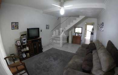 Imagem: A casa possui 2 Dormitórios, 2 Banheiros, 1 Vaga na garagem