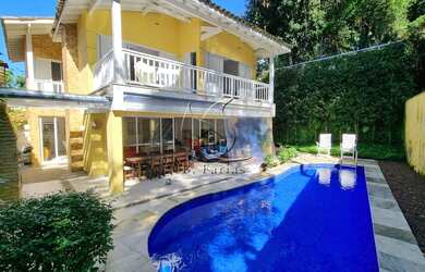 Imagem: A casa em condomínio possui 5 Dormitórios, 5 Banheiros, 2