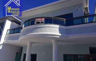 Imagem: A casa possui 4 Dormitórios, 4 Banheiros, 2 Vagas na garagem