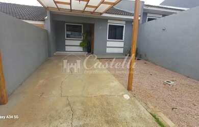 Imagem: A casa possui 2 Dormitórios, 2 Banheiros, 2 Vagas na garagem