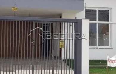 Imagem: A casa possui 3 Dormitórios, 2 Banheiros, 2 Vagas na garagem