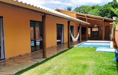 Imagem: A casa possui 5 Dormitórios, 5 Banheiros, 2 Vagas na garagem