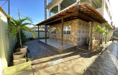 Imagem: A casa possui 5 Dormitórios, 4 Banheiros, 2 Vagas na garagem