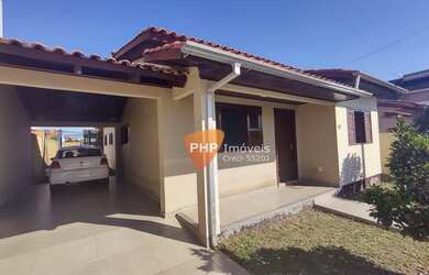 Imagem: A casa possui 3 Dormitórios, 1 Banheiro, 1 Vaga na garagem